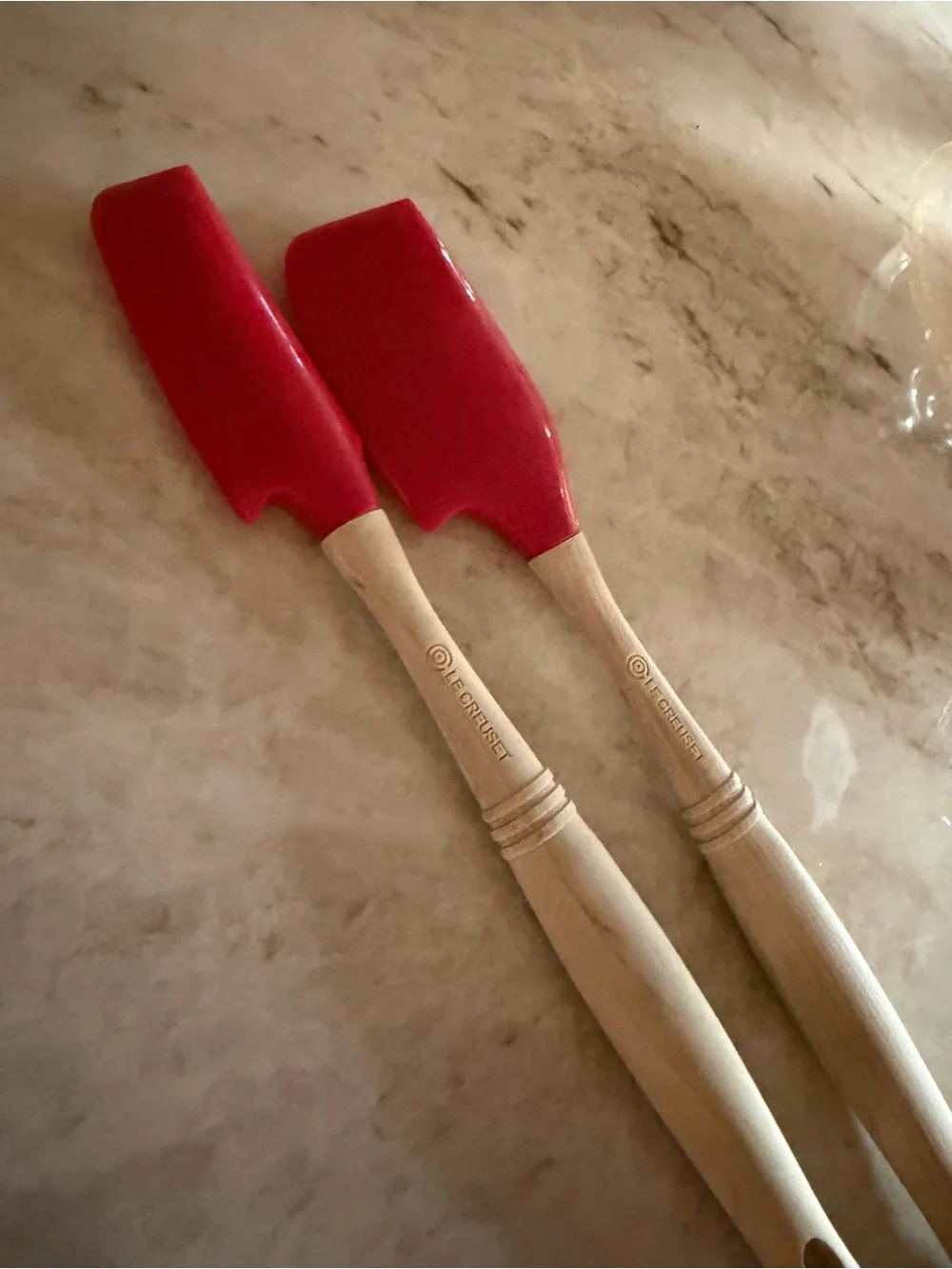 Le Creuset silicone mixing spatulas in Cerise (red)